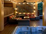 Private hot tub and seating on the lower level deck